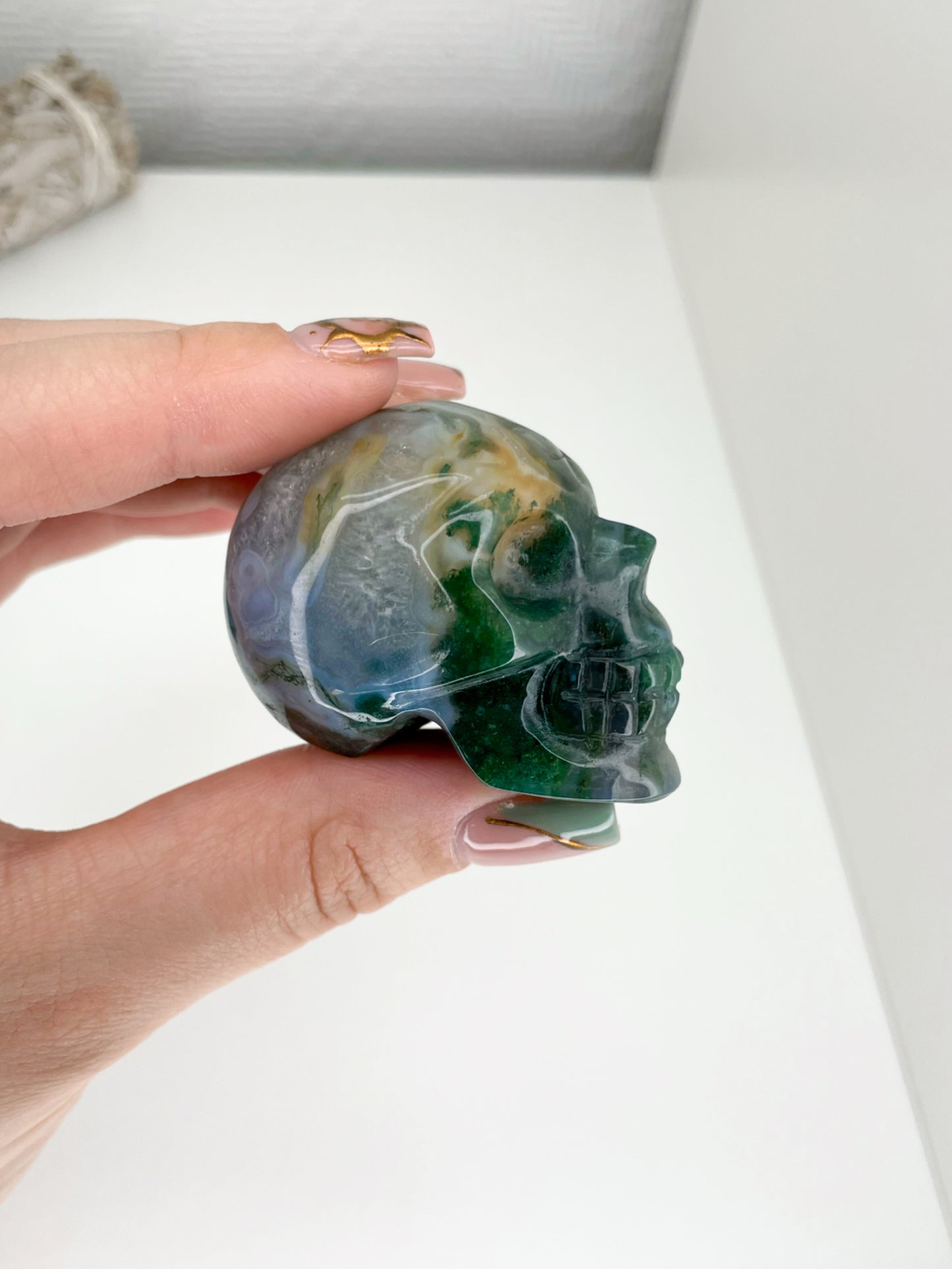 Moss Agate Skulls