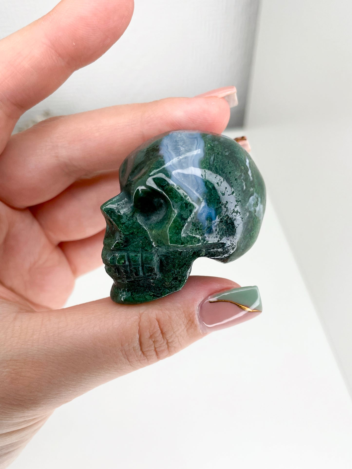 Moss Agate Skulls